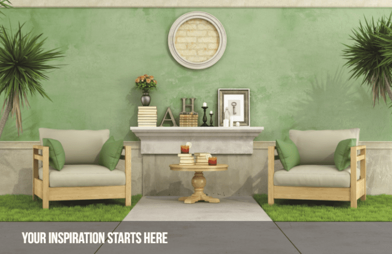 Home and garden show display with green wall, chairs, plants, and fireplace